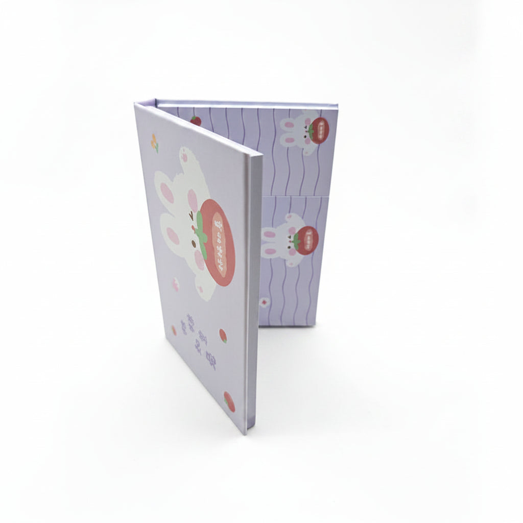 Libro con notas adhesivas conejito