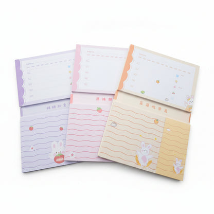 Libro con notas adhesivas conejito